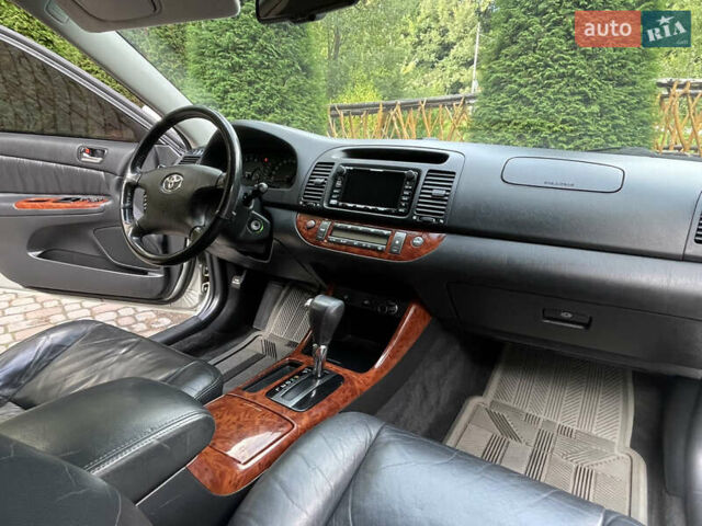 Серый Тойота Камри, объемом двигателя 3 л и пробегом 240 тыс. км за 6250 $, фото 31 на Automoto.ua