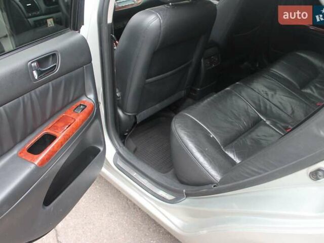 Серый Тойота Камри, объемом двигателя 2.4 л и пробегом 375 тыс. км за 5500 $, фото 12 на Automoto.ua