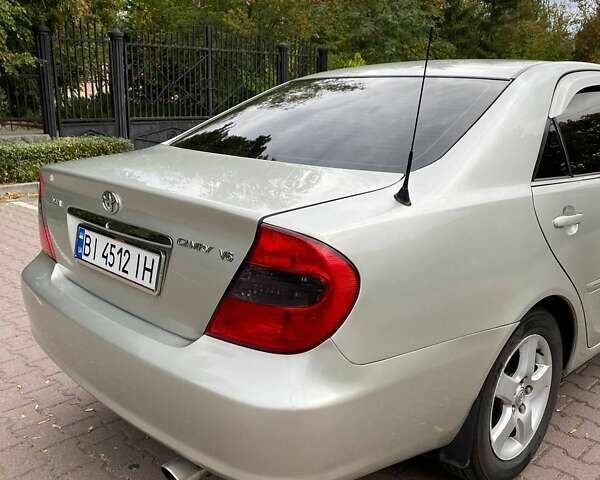 Серый Тойота Камри, объемом двигателя 3 л и пробегом 303 тыс. км за 4500 $, фото 7 на Automoto.ua