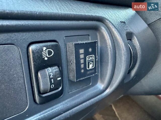 Серый Тойота Камри, объемом двигателя 2.4 л и пробегом 257 тыс. км за 5400 $, фото 48 на Automoto.ua