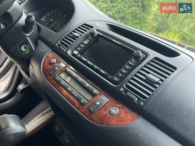 Серый Тойота Камри, объемом двигателя 3 л и пробегом 240 тыс. км за 6250 $, фото 25 на Automoto.ua