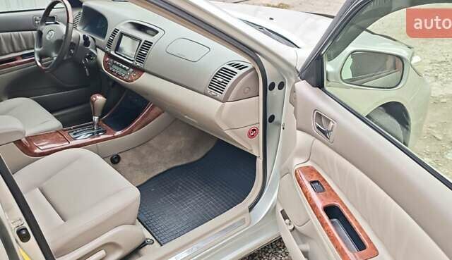 Серый Тойота Камри, объемом двигателя 2.36 л и пробегом 260 тыс. км за 6500 $, фото 4 на Automoto.ua