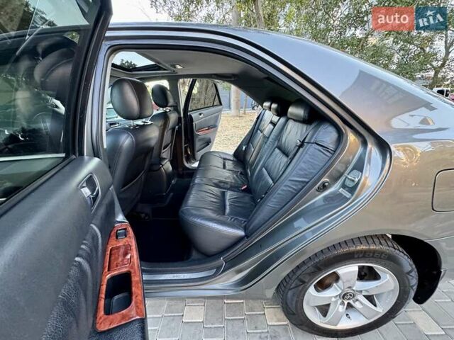 Серый Тойота Камри, объемом двигателя 2.4 л и пробегом 257 тыс. км за 5400 $, фото 41 на Automoto.ua