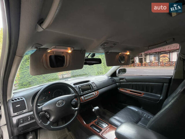 Серый Тойота Камри, объемом двигателя 3 л и пробегом 240 тыс. км за 6250 $, фото 37 на Automoto.ua