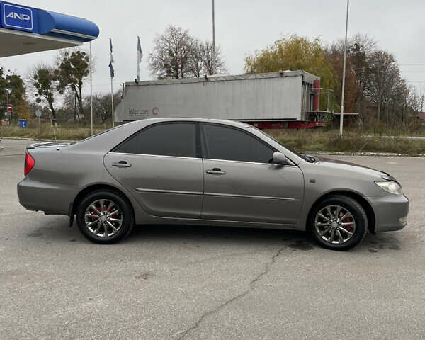 Сірий Тойота Камрі, об'ємом двигуна 3 л та пробігом 384 тис. км за 5500 $, фото 24 на Automoto.ua