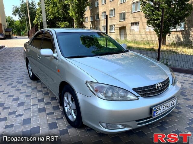 Серый Тойота Камри, объемом двигателя 3 л и пробегом 280 тыс. км за 6100 $, фото 1 на Automoto.ua