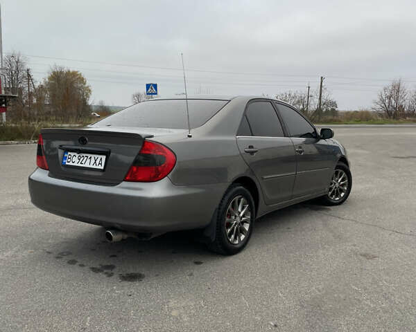 Сірий Тойота Камрі, об'ємом двигуна 3 л та пробігом 384 тис. км за 5500 $, фото 21 на Automoto.ua