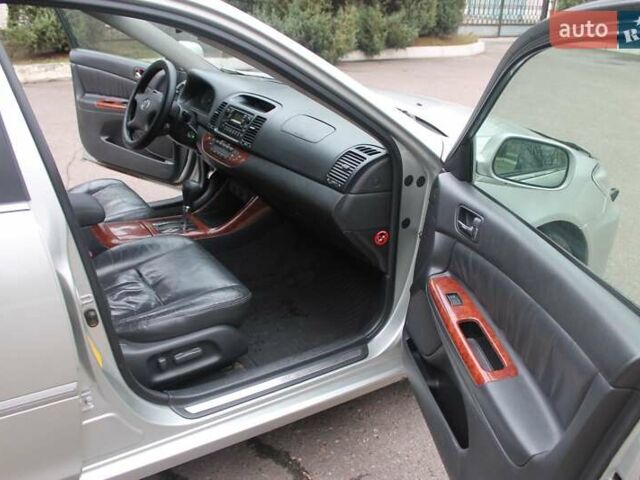 Серый Тойота Камри, объемом двигателя 2.4 л и пробегом 375 тыс. км за 5500 $, фото 14 на Automoto.ua