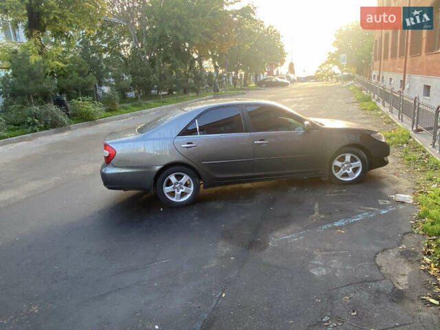 Серый Тойота Камри, объемом двигателя 2.36 л и пробегом 270 тыс. км за 5100 $, фото 3 на Automoto.ua