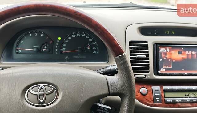 Серый Тойота Камри, объемом двигателя 2.36 л и пробегом 260 тыс. км за 6500 $, фото 15 на Automoto.ua
