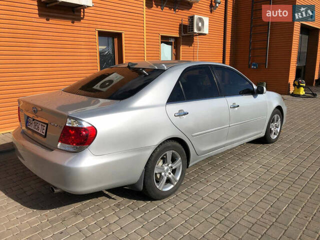 Сірий Тойота Камрі, об'ємом двигуна 2.36 л та пробігом 265 тис. км за 4800 $, фото 2 на Automoto.ua