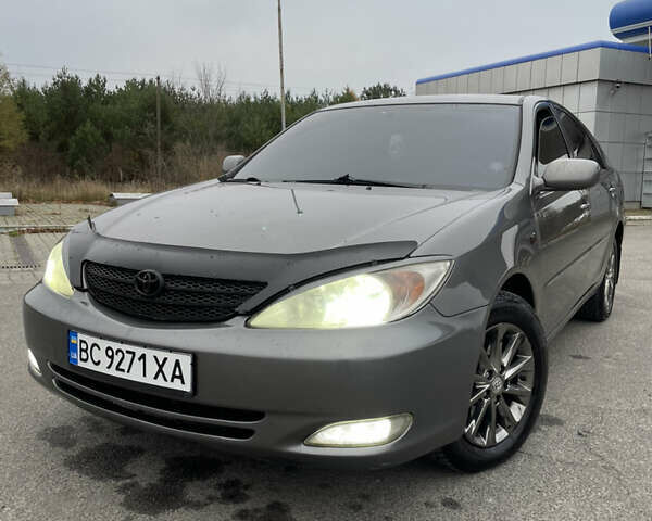 Сірий Тойота Камрі, об'ємом двигуна 3 л та пробігом 384 тис. км за 5500 $, фото 4 на Automoto.ua