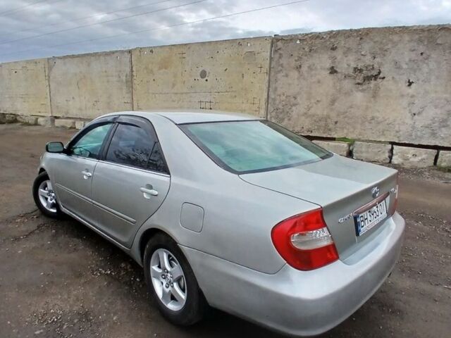 Серый Тойота Камри, объемом двигателя 2.4 л и пробегом 300 тыс. км за 4200 $, фото 2 на Automoto.ua