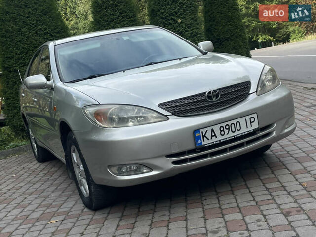 Серый Тойота Камри, объемом двигателя 3 л и пробегом 240 тыс. км за 6250 $, фото 7 на Automoto.ua