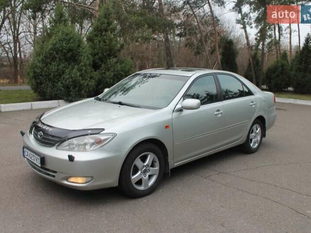 Серый Тойота Камри, объемом двигателя 2.4 л и пробегом 375 тыс. км за 5500 $, фото 9 на Automoto.ua