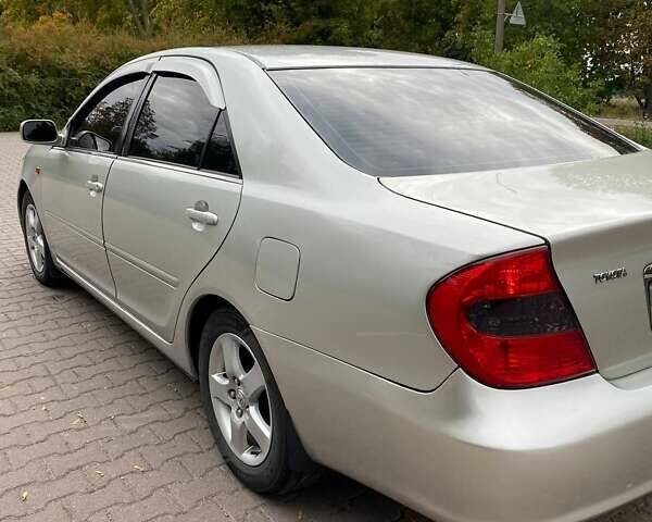 Серый Тойота Камри, объемом двигателя 3 л и пробегом 303 тыс. км за 4500 $, фото 9 на Automoto.ua