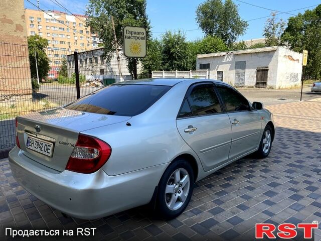 Серый Тойота Камри, объемом двигателя 3 л и пробегом 280 тыс. км за 6100 $, фото 2 на Automoto.ua