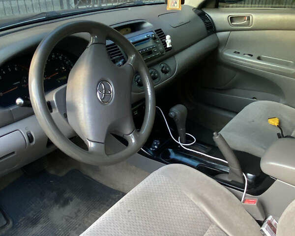 Серый Тойота Камри, объемом двигателя 2.36 л и пробегом 270 тыс. км за 5100 $, фото 5 на Automoto.ua