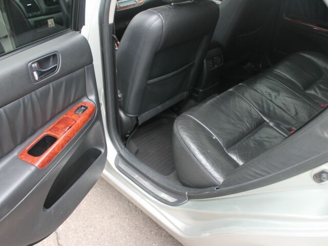 Серый Тойота Камри, объемом двигателя 2.4 л и пробегом 375 тыс. км за 5550 $, фото 12 на Automoto.ua