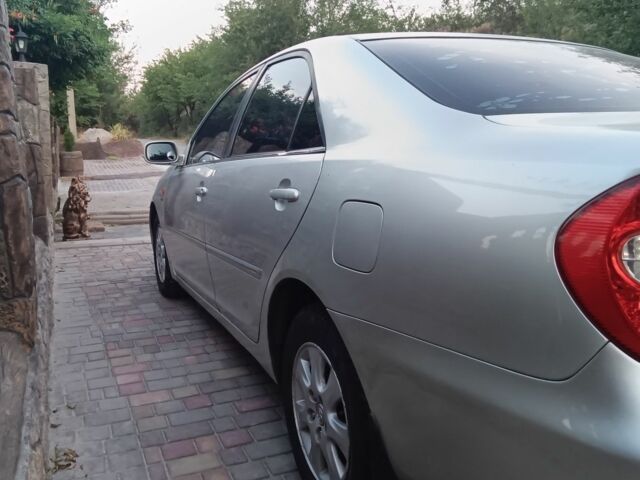 Серый Тойота Камри, объемом двигателя 2.4 л и пробегом 500 тыс. км за 3700 $, фото 9 на Automoto.ua