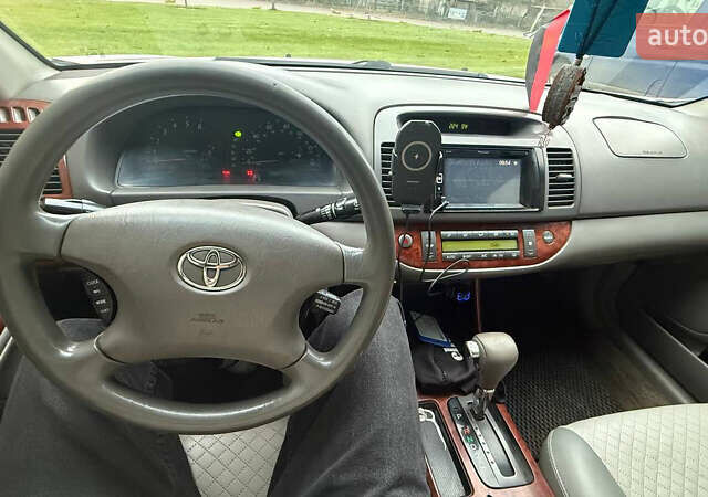 Серый Тойота Камри, объемом двигателя 2.4 л и пробегом 400 тыс. км за 5000 $, фото 9 на Automoto.ua