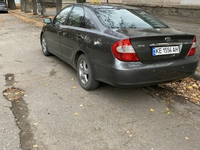 Серый Тойота Камри, объемом двигателя 2.4 л и пробегом 370 тыс. км за 4800 $, фото 4 на Automoto.ua