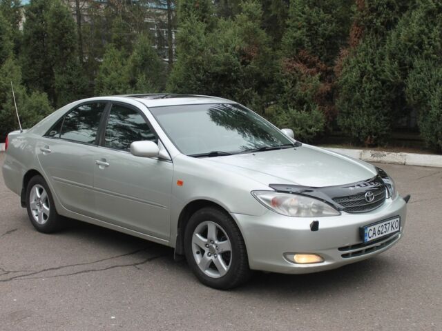 Серый Тойота Камри, объемом двигателя 2.4 л и пробегом 375 тыс. км за 5550 $, фото 1 на Automoto.ua