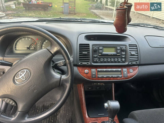 Серый Тойота Камри, объемом двигателя 3 л и пробегом 205 тыс. км за 4500 $, фото 5 на Automoto.ua