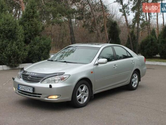 Серый Тойота Камри, объемом двигателя 2.4 л и пробегом 375 тыс. км за 5500 $, фото 8 на Automoto.ua