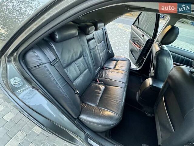 Серый Тойота Камри, объемом двигателя 2.4 л и пробегом 257 тыс. км за 5400 $, фото 18 на Automoto.ua