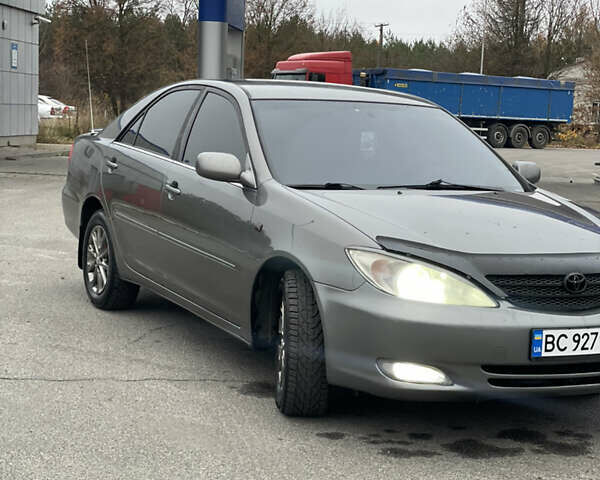 Сірий Тойота Камрі, об'ємом двигуна 3 л та пробігом 384 тис. км за 5500 $, фото 11 на Automoto.ua