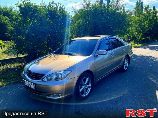 Сірий Тойота Камрі, об'ємом двигуна 3 л та пробігом 390 тис. км за 6000 $, фото 1 на Automoto.ua