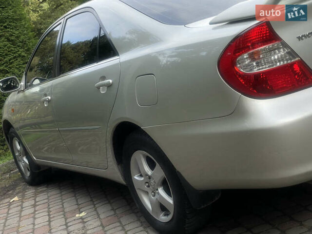 Серый Тойота Камри, объемом двигателя 3 л и пробегом 240 тыс. км за 6250 $, фото 14 на Automoto.ua