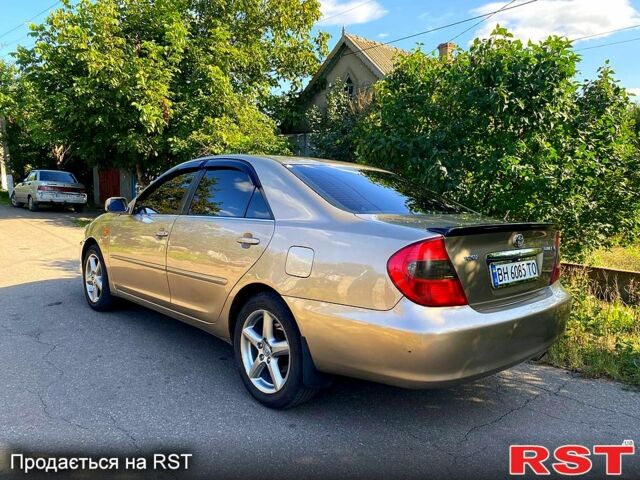 Сірий Тойота Камрі, об'ємом двигуна 3 л та пробігом 390 тис. км за 6000 $, фото 2 на Automoto.ua