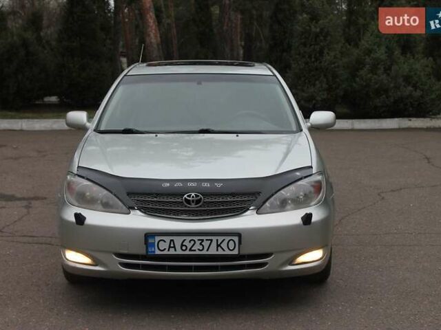 Серый Тойота Камри, объемом двигателя 2.4 л и пробегом 375 тыс. км за 5500 $, фото 10 на Automoto.ua