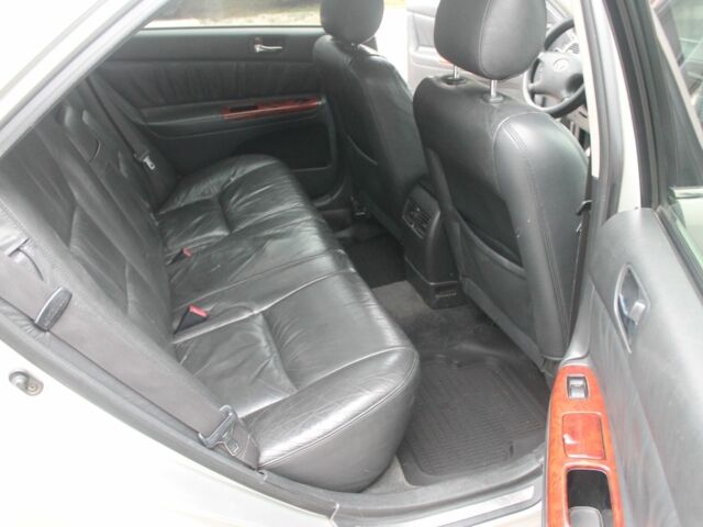 Серый Тойота Камри, объемом двигателя 2.4 л и пробегом 375 тыс. км за 5550 $, фото 13 на Automoto.ua