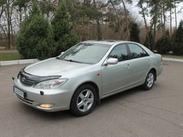 Серый Тойота Камри, объемом двигателя 2.4 л и пробегом 375 тыс. км за 5550 $, фото 8 на Automoto.ua