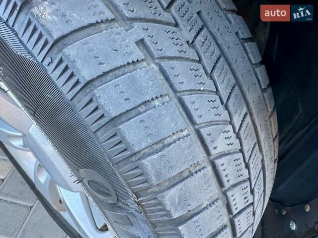 Серый Тойота Камри, объемом двигателя 2.4 л и пробегом 257 тыс. км за 5400 $, фото 54 на Automoto.ua