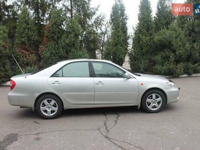 Серый Тойота Камри, объемом двигателя 2.4 л и пробегом 375 тыс. км за 5500 $, фото 2 на Automoto.ua