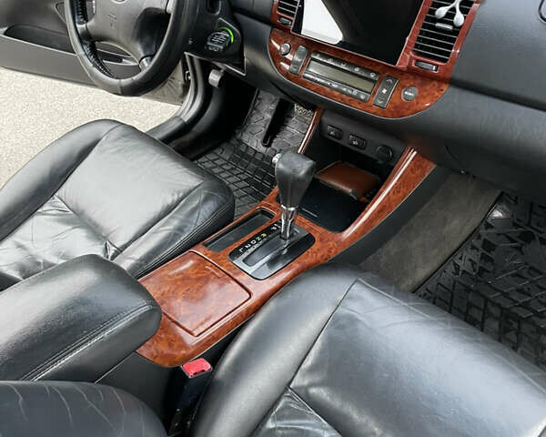 Сірий Тойота Камрі, об'ємом двигуна 3 л та пробігом 384 тис. км за 5500 $, фото 32 на Automoto.ua