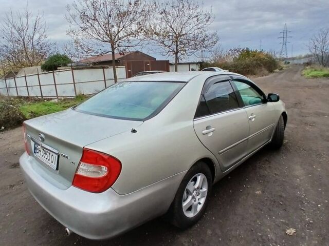 Серый Тойота Камри, объемом двигателя 2.4 л и пробегом 300 тыс. км за 4200 $, фото 3 на Automoto.ua