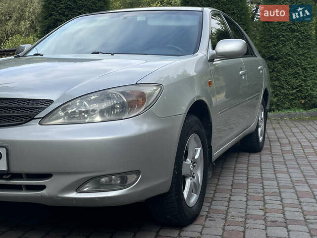 Серый Тойота Камри, объемом двигателя 3 л и пробегом 240 тыс. км за 6250 $, фото 4 на Automoto.ua