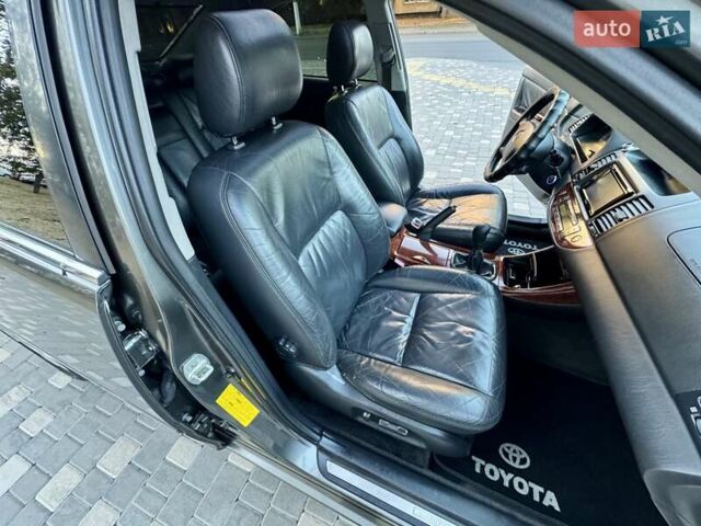 Серый Тойота Камри, объемом двигателя 2.4 л и пробегом 257 тыс. км за 5400 $, фото 31 на Automoto.ua