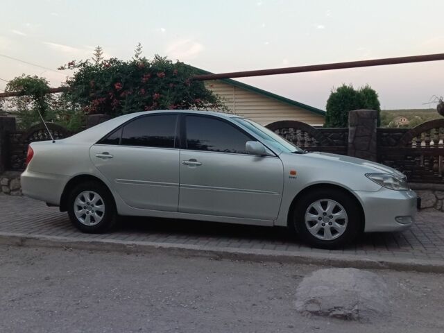 Серый Тойота Камри, объемом двигателя 2.4 л и пробегом 500 тыс. км за 3700 $, фото 1 на Automoto.ua