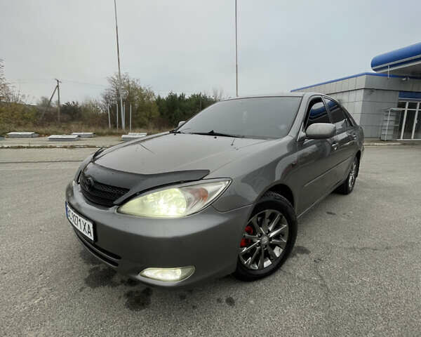 Сірий Тойота Камрі, об'ємом двигуна 3 л та пробігом 384 тис. км за 5500 $, фото 2 на Automoto.ua