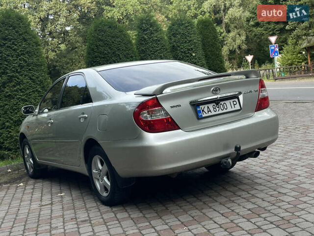 Серый Тойота Камри, объемом двигателя 3 л и пробегом 240 тыс. км за 6250 $, фото 12 на Automoto.ua