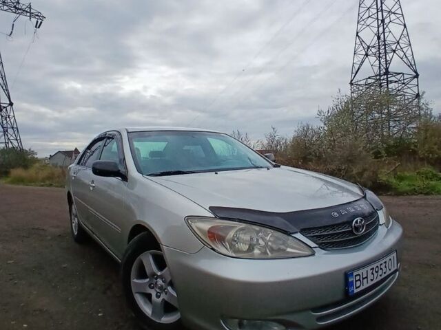 Серый Тойота Камри, объемом двигателя 2.4 л и пробегом 300 тыс. км за 4200 $, фото 4 на Automoto.ua