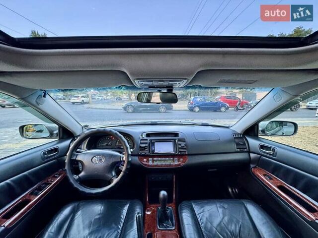 Серый Тойота Камри, объемом двигателя 2.4 л и пробегом 257 тыс. км за 5400 $, фото 14 на Automoto.ua