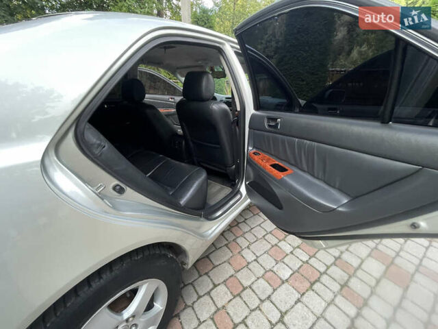 Серый Тойота Камри, объемом двигателя 3 л и пробегом 240 тыс. км за 6250 $, фото 29 на Automoto.ua