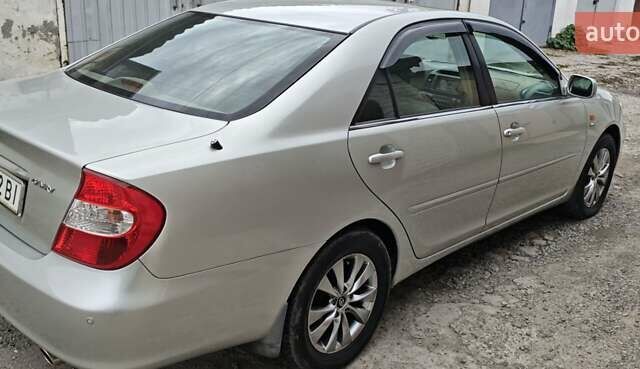 Серый Тойота Камри, объемом двигателя 2.36 л и пробегом 260 тыс. км за 6500 $, фото 8 на Automoto.ua